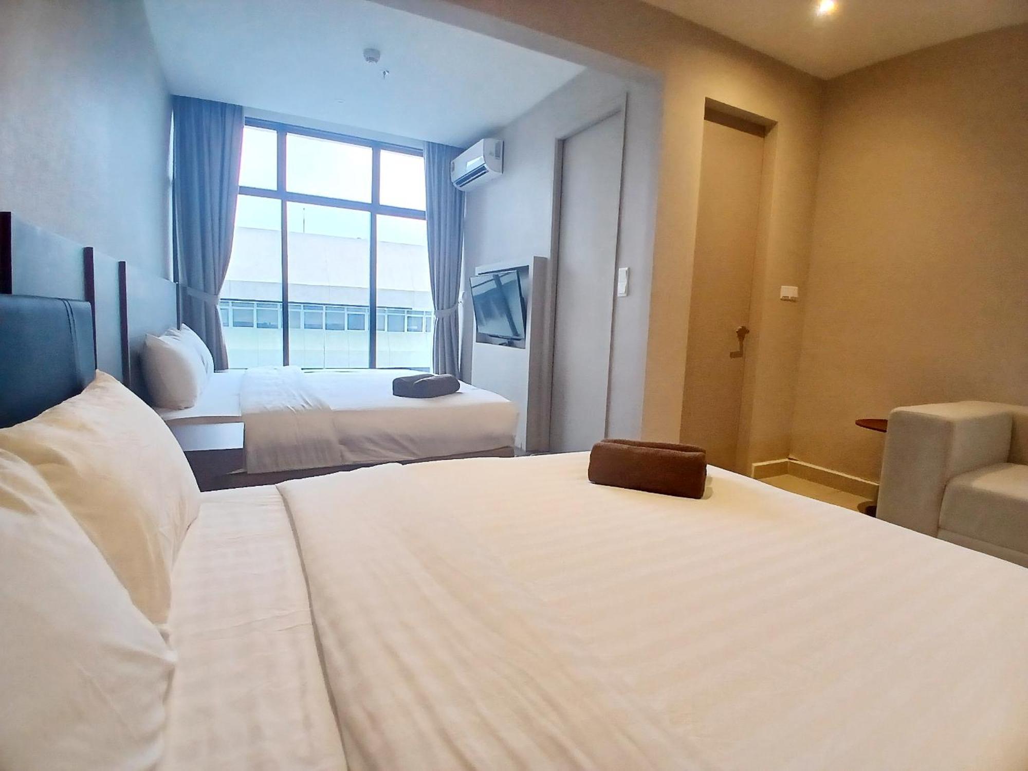 The Shore Kota Kinabalu City Centre By Lw Suites Rum bild